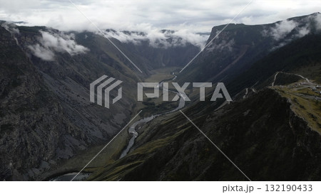 Chulyshman valley, altai republic, russia: winding river flowing through dramatic landscape. Media Chulyshman valley, altai republic, russia: winding river flowing through dramatic landscape. Media 132190433
