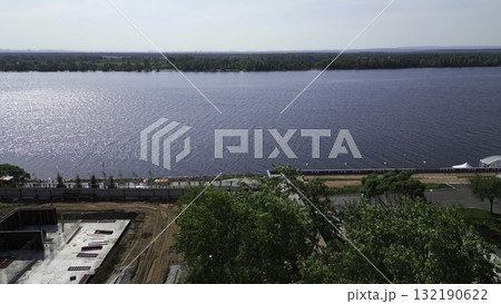 Sunlight reflecting on amur river during blagoveshchensk embankment construction. Clip Sunlight reflecting on amur river during blagoveshchensk embankment construction. Clip 132190622