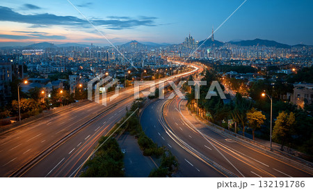 Evening Cityscape of Seoul Illuminated with Traffic Trails 132191786