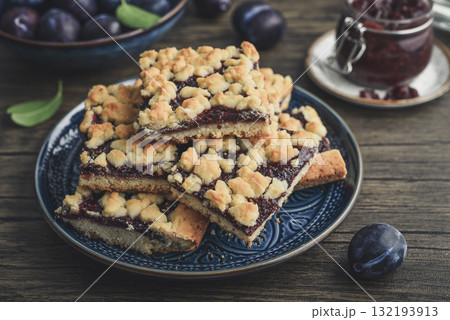 Traditional German Zwetschgenkuchen on blue plate 132193913