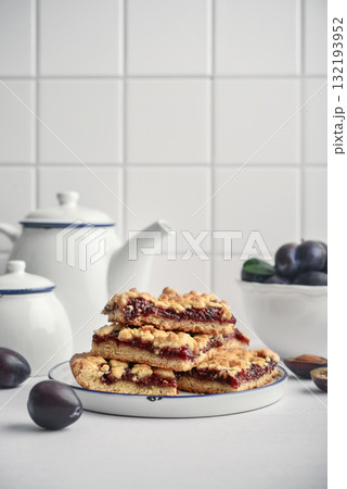 Traditional German Zwetschgenkuchen on white plate 132193952