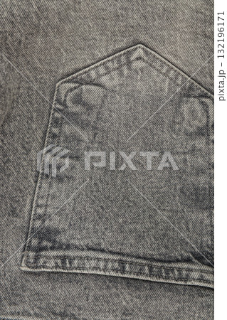 Close-up view of gray denim fabric with pocket detail 132196171