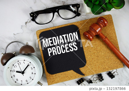 Mediation Process text on speech bubble with alarm clock and wooden gavel on marble background Mediation Process text on speech bubble with alarm clock and wooden gavel on marble background 132197866