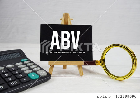 ABV abbreviation of Accredited in Business Valuation text with magnifying glass and calculator on wooden background ABV abbreviation of Accredited in Business Valuation text with magnifying glass and calculator on wooden background 132199696