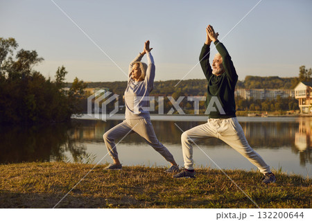 Senior people yoga and fitness outdoor, stretching practice, group of old mature spouses working out Senior people yoga and fitness outdoor, stretching practice, group of old mature spouses working out 132200644
