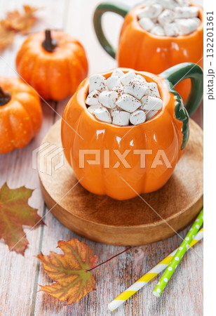 Pumpkin mug hot chocolate with marshmallows cozy autumn Pumpkin mug hot chocolate with marshmallows cozy autumn 132201361