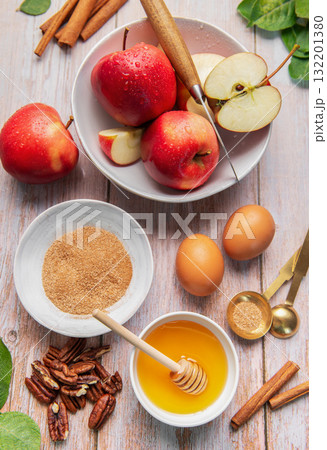 Baking ingredients for apple dessert on wooden table 132201380
