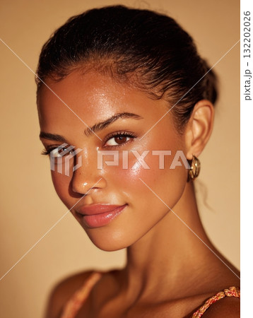 Woman featuring glowy skin with a natural dewy makeup look Woman featuring glowy skin with a natural dewy makeup look 132202026