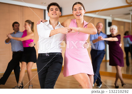 young woman with partner dance jive 132210292