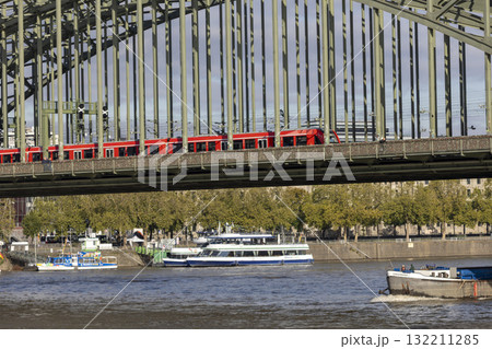 train is moving across the Hohenzollern bridge 132211285
