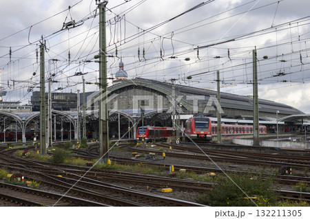 The train moves to the Cologne central station near the Hohenzollern bridge 132211305