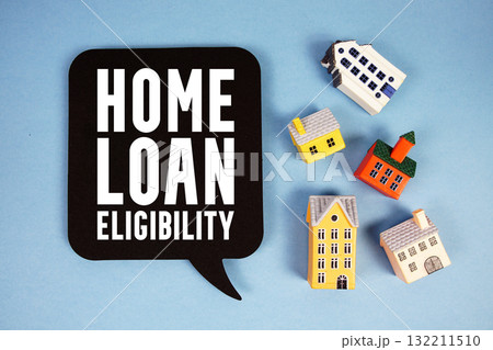 Home Loan Eligibility text with house models on blue background 132211510