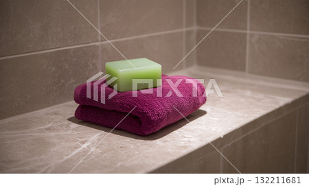Green Soap Bar on Soft Towel Creating Cozy and Relaxing Bathroom Scene 132211681