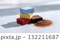 Minimalist Composition with Colorful Wooden Blocks and Brown Powder on White Surface 132211687