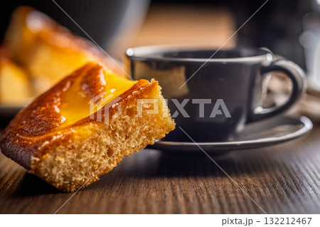 Catalana sponge cake on wooden table. 132212467