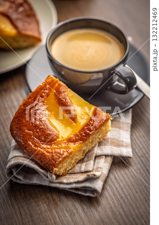 Catalana sponge cake on wooden table. Catalana sponge cake on wooden table. 132212469