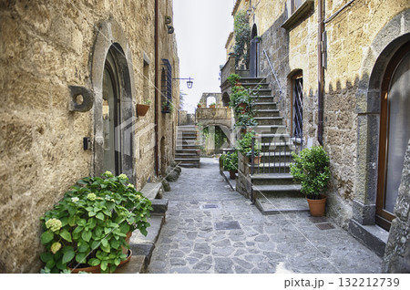 Picturesque Cobblestone Street in Ancient Civita di Bagnoregio, Italy Picturesque Cobblestone Street in Ancient Civita di Bagnoregio, Italy 132212739