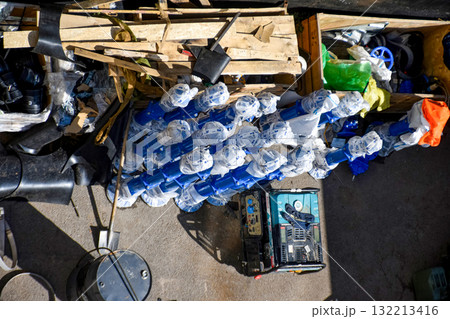 Repair of city water supply pipes, industrial site with equipment and materials for water pipe repair, top view 132213416
