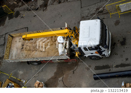 Industrial truck with hydraulic crane at construction site, top view 132213419