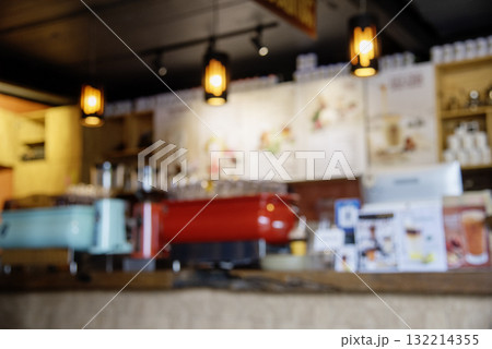 Blurry shopping mall background of store grocery. Blurred background shopping mall light bokeh business event retail store. Blur Convention hall center audience present display goods shelf products 132214355