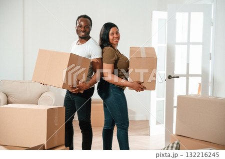 Bunch of boxes. African American couple are moving into new house 132216245