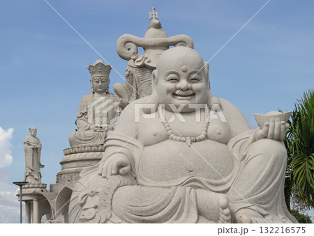 The statue Laughing Buddha. also known as Budai in China or Hotei in Japan. 132216575