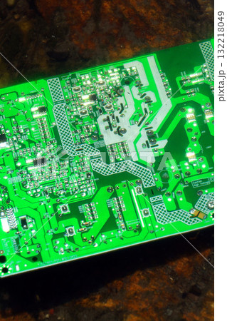 Computer motherboard submerged below water surface, cooling and energy consumption by artificial intelligence concept, environmental impacts Computer motherboard submerged below water surface, cooling and energy consumption by artificial intelligence concept, environmental impacts 132218049