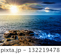 sea coast with rocks and boulders. day and night time change concept. calm summer vacation background at the seashore. wonderful scene for relax and leisure at the seaside with sun and moon 132219478
