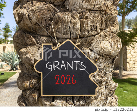 Grants 2026 symbol. Concept words Grants 2026 on beautiful black blackboard. Beautiful palm tree palm-tree background. Business and grants 2026 concept. Copy space. Grants 2026 symbol. Concept words Grants 2026 on beautiful black blackboard. Beautiful palm tree palm-tree background. Business and grants 2026 concept. Copy space. 132220212