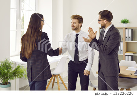 Successful business people meet, cooperate, make a deal, and exchange handshakes Successful business people meet, cooperate, make a deal, and exchange handshakes 132220220