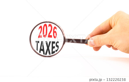 2026 taxes new year symbol. Concept words 2026 taxes on beautiful white paper. Black magnifying glass. Beautiful white paper background. Business and 2026 taxes new year concept. Copy space. 2026 taxes new year symbol. Concept words 2026 taxes on beautiful white paper. Black magnifying glass. Beautiful white paper background. Business and 2026 taxes new year concept. Copy space. 132220238