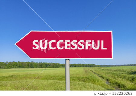 Successful symbol. Concept word Successful on beautiful red road sign. Beautiful blue sky green grass and forest peaceful nature background. Business successful concept. Copy space. Successful symbol. Concept word Successful on beautiful red road sign. Beautiful blue sky green grass and forest peaceful nature background. Business successful concept. Copy space. 132220262