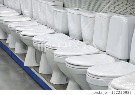 White ceramic toilets at the store White ceramic toilets at the store 132220985