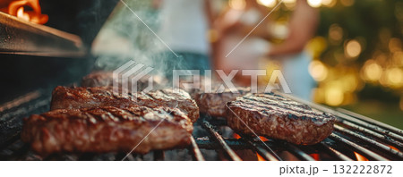 Juicy Steaks Grilling at Outdoor Summer BBQ Party Juicy Steaks Grilling at Outdoor Summer BBQ Party 132222872
