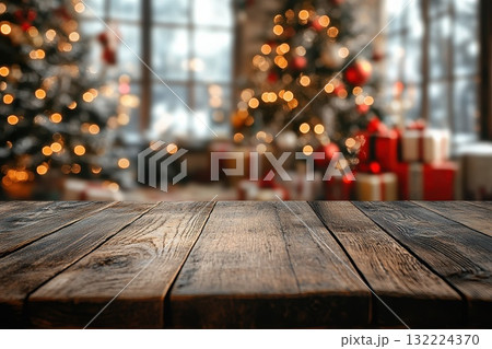 Wooden Table with Blurred Christmas Scene and Festive Decorations in Background 132224370