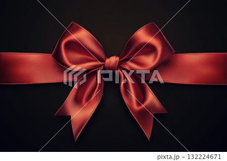 Elegant Red Satin Bow with Ribbon on Dark Background for Gift Wrapping and Decoration 132224671
