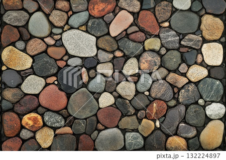 Colorful Collection of Natural Pebbles and River Stones Perfect for Backgrounds or Textures in Art and Design Projects 132224897