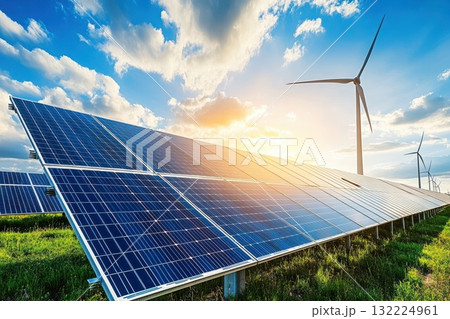 Solar Farm View in Desert Land, Showcasing Rows of Solar Panels and Wind Turbines Under a Beautiful Sky at Sunset 132224961