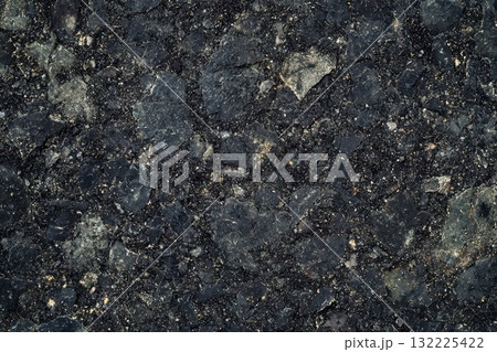 High-Resolution Image of Dark Asphalt Texture Featuring Varied Fragments and Natural Stone Patterns for Urban and Industrial Design Applications 132225422