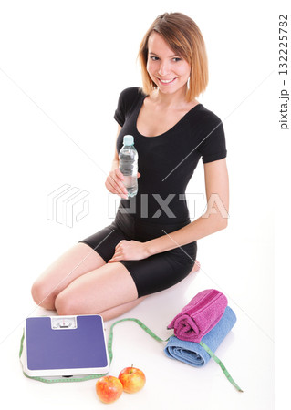 Caucasian young woman weight scale isolated white Caucasian young woman weight scale isolated white 132225782
