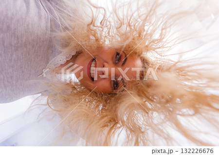 Woman with wet blonde hair 132226676