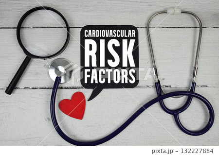 Cardiovascular Risk Factors text with Red heart, Magnifying glass and Medical Stethoscope on wooden background Cardiovascular Risk Factors text with Red heart, Magnifying glass and Medical Stethoscope on wooden background 132227884
