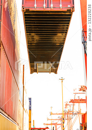Containers transported by crane. Containers transported by crane. 132228238