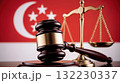 Justice gavel and scales with Singapore flag background 132230337