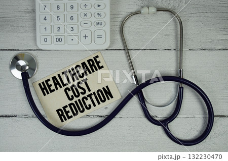 Healthcare Cost Reduction text with Stethoscope and calculator on wooden background Healthcare Cost Reduction text with Stethoscope and calculator on wooden background 132230470