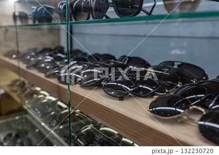 Display of Stylish Sunglasses in a Retail Store 132230720