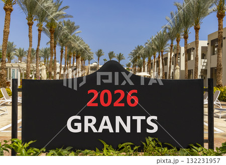 2026 Grants symbol. Concept words 2026 Grants on beautiful black road sign. Beautiful palm trees palm-trees and blue sky background. Business and 2026 grants concept. Copy space. 2026 Grants symbol. Concept words 2026 Grants on beautiful black road sign. Beautiful palm trees palm-trees and blue sky background. Business and 2026 grants concept. Copy space. 132231957