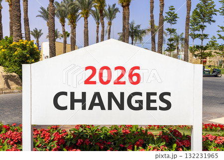 2026 Changes symbol. Concept words 2026 Changes on beautiful white road sign. Beautiful palm trees palm-trees and blue sky background. Business and 2026 changes concept. Copy space. 2026 Changes symbol. Concept words 2026 Changes on beautiful white road sign. Beautiful palm trees palm-trees and blue sky background. Business and 2026 changes concept. Copy space. 132231965