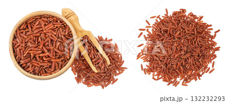 red rice in a wooden bowl isolated on white background. Top view. Flat lay red rice in a wooden bowl isolated on white background. Top view. Flat lay 132232293