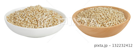 Sorghum seeds in ceramic and wooden bowl isolated on white background with full depth of field. 132232412